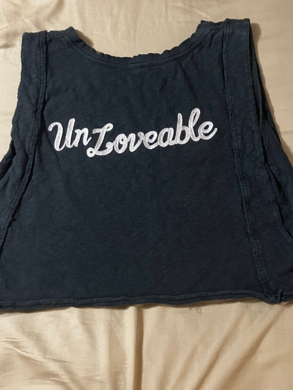 We The Free “UnLoveable” sleeveless crop top